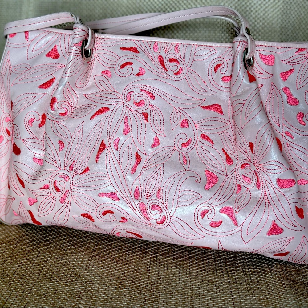 Cole Haan gorgeous unique pink double pocket leather bag.